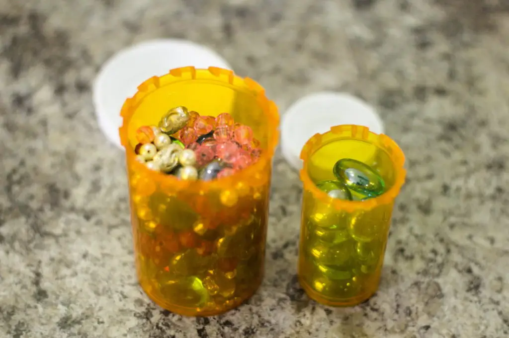 Reused pill bottle - jewelry and beads
