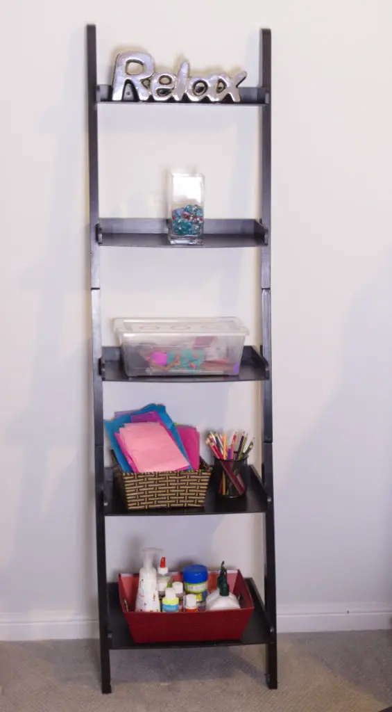 ladder shelf with craft supplies