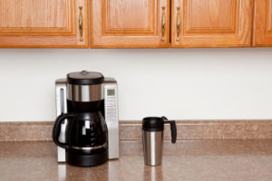 Coffee maker and stainless steel travel mug