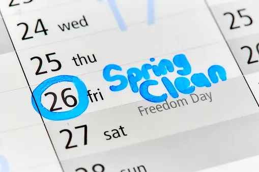 Calendar with a circle around 26 and the words "spring clean"